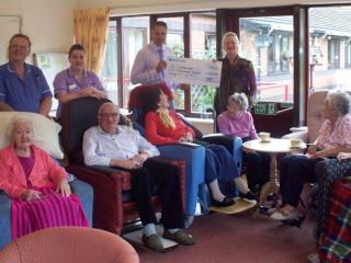 St Catherine's care home receives donation from Woodlands Brewery