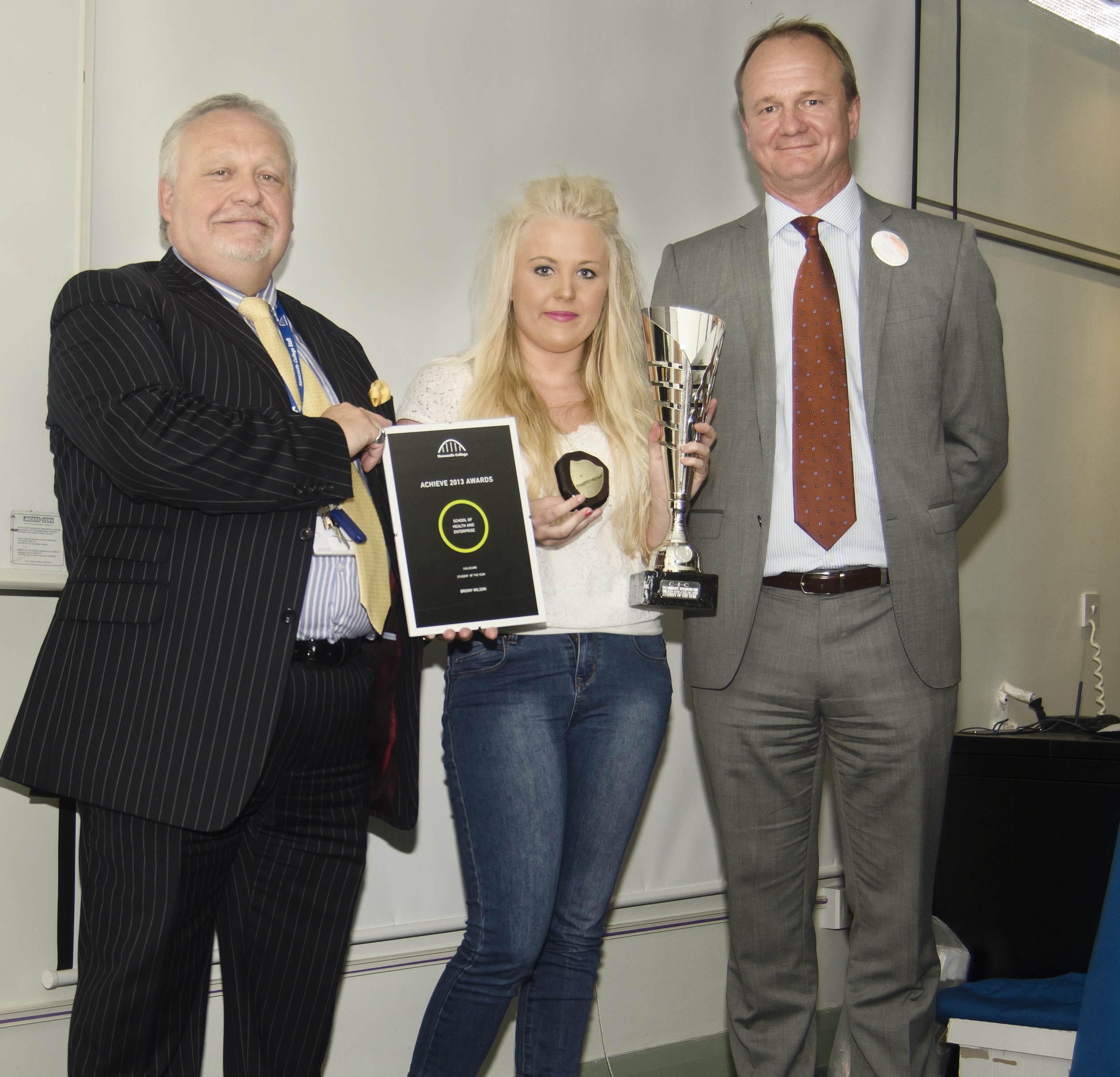 Wayne Mason presents the 'Outstanding Childcare Student of the Year' Award