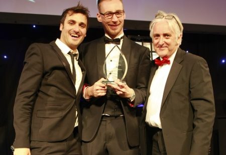Marek Dziankowski collecting award