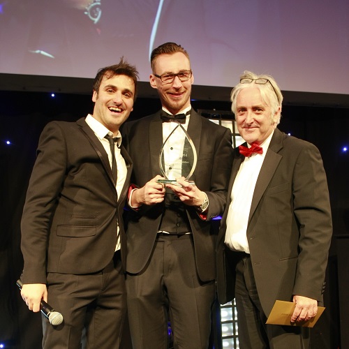 Marek Dziankowski collecting award
