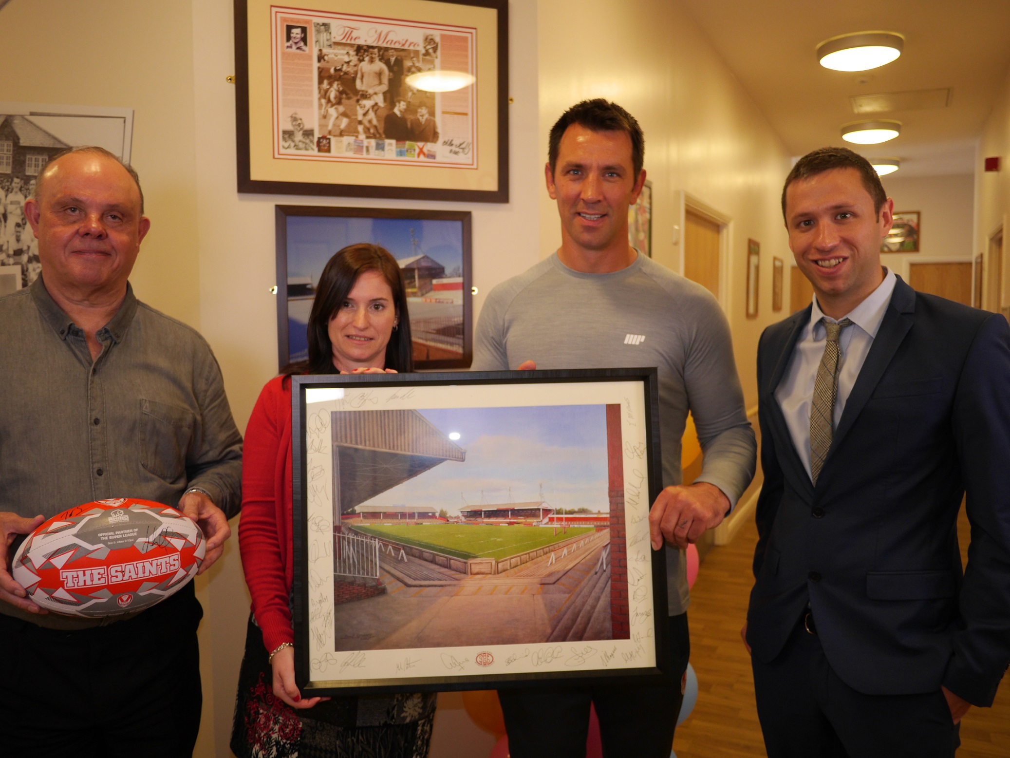 Paul and Eddie present gifts to Community Integrated Care