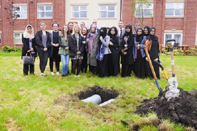 Students burying their time capsules at EachStep Blackburn