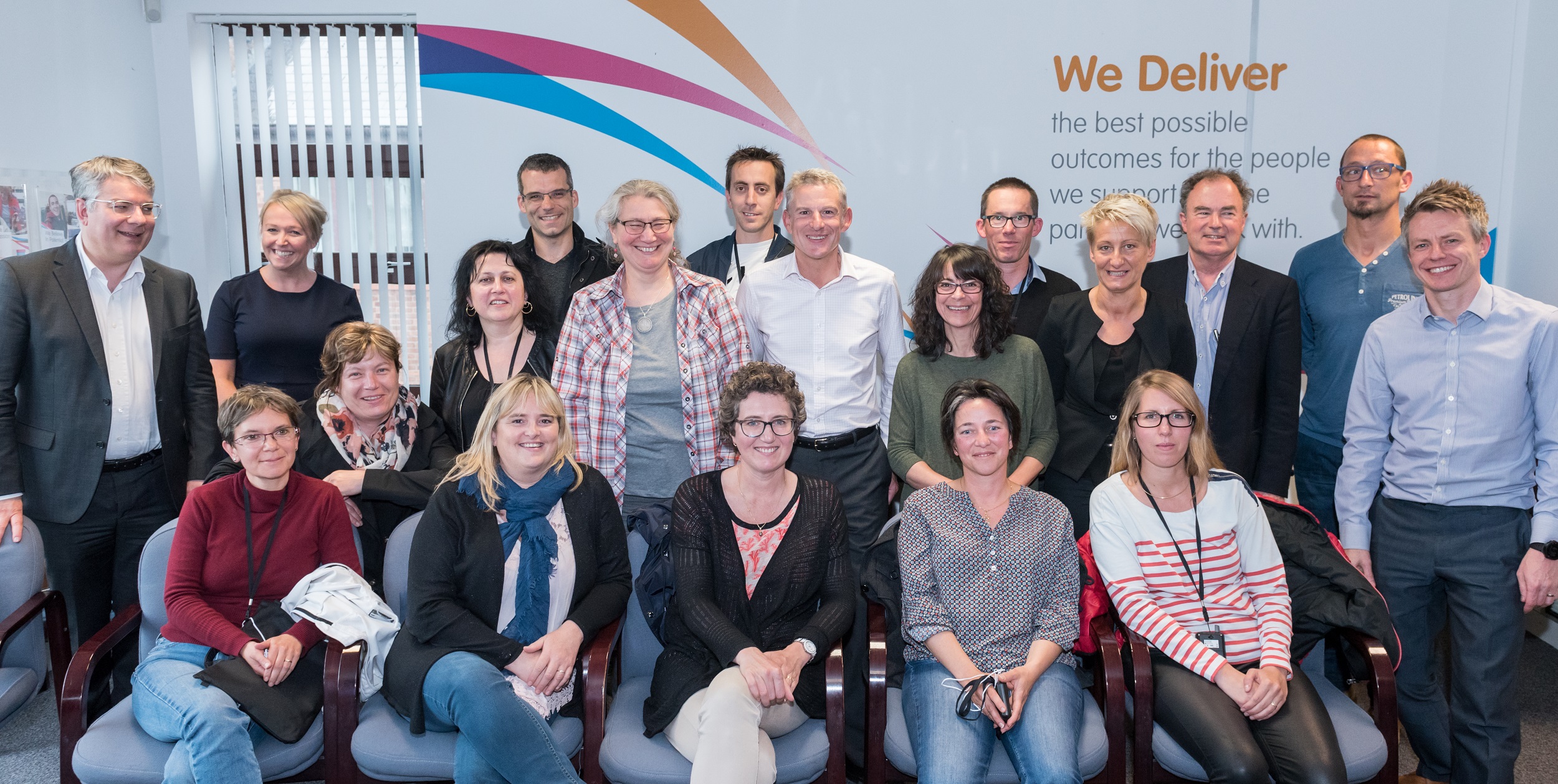 Community Integrated Care's Interim Chief Executive Officer Phil Pegler (centre) with delegates from John Bost Foundation