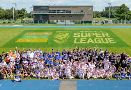 Learning Disability Super League Players cheering at Warrington event