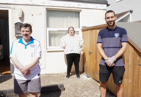 Ben Close Portsmouth FC with people supported by Community Integrated Care