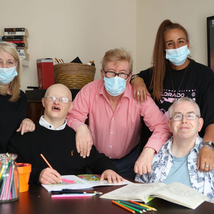 Group with colouring books