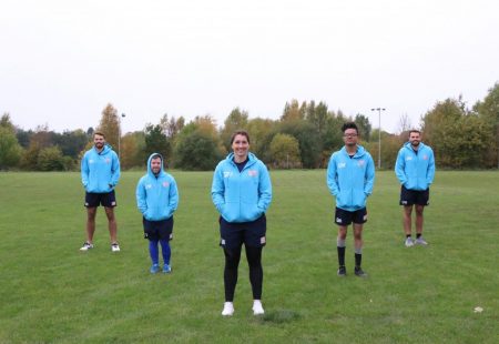 Learning disability super league ambassadors launch the ldsl skills journal programme. Five people stood in a park