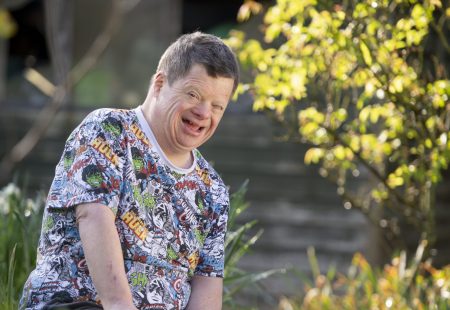 Person supported smiling