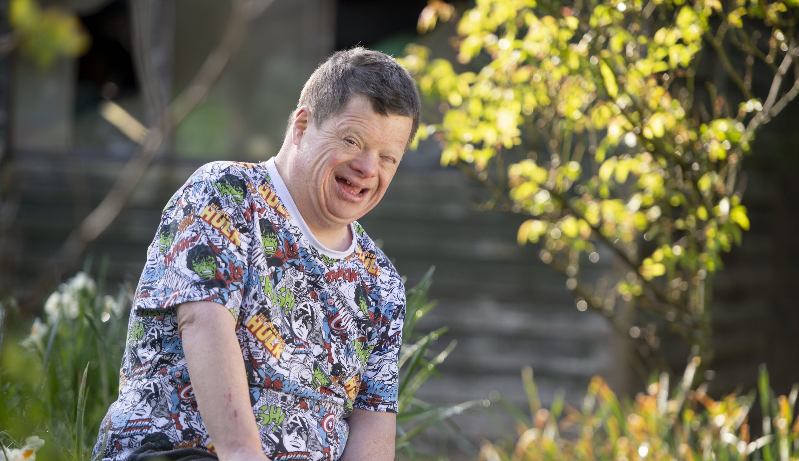 Person supported smiling