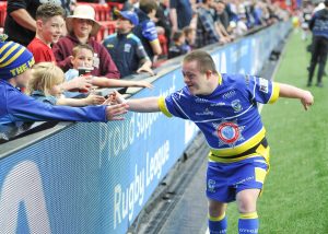Learning disability super league player reaches out to crowd at anfield