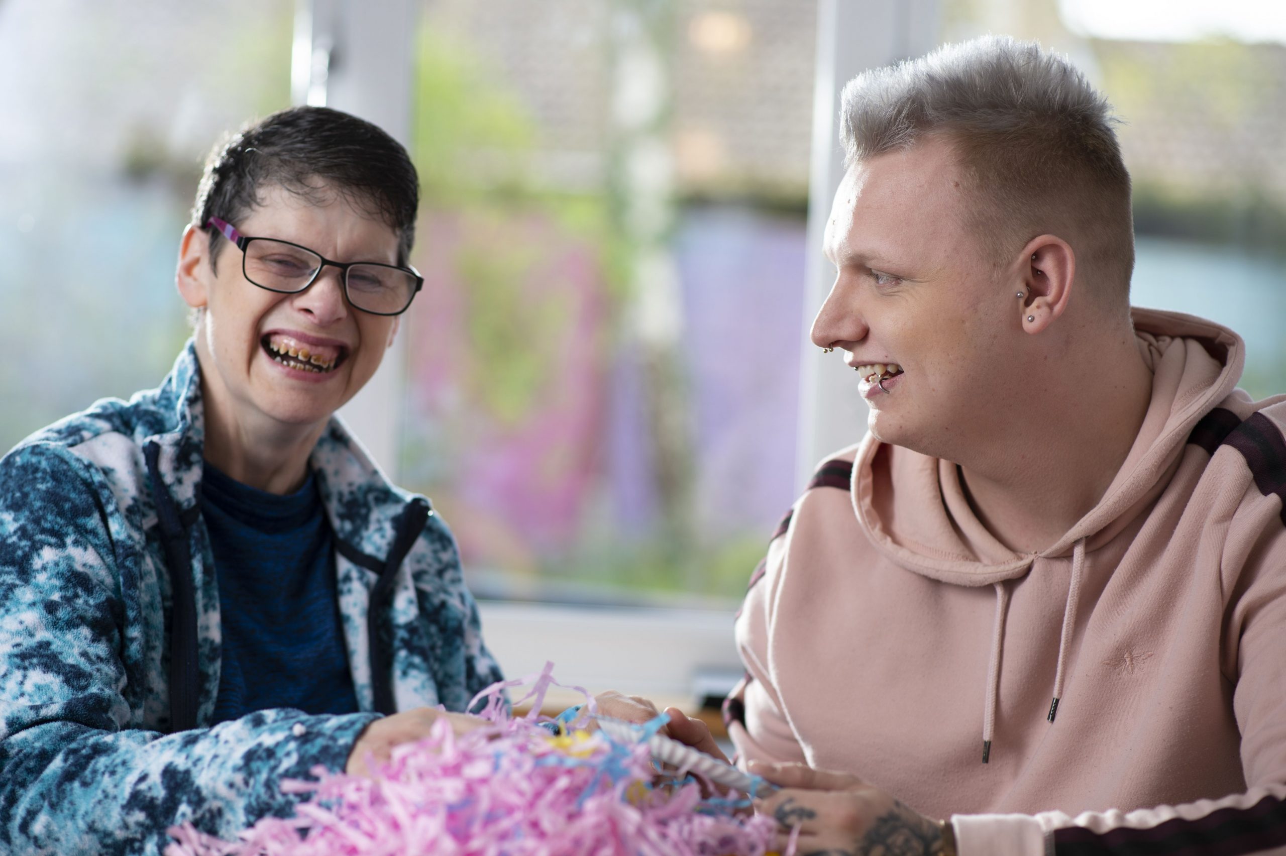 Two people laughing