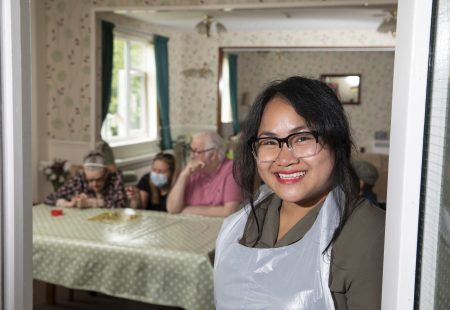 Colleague smiling in doorway