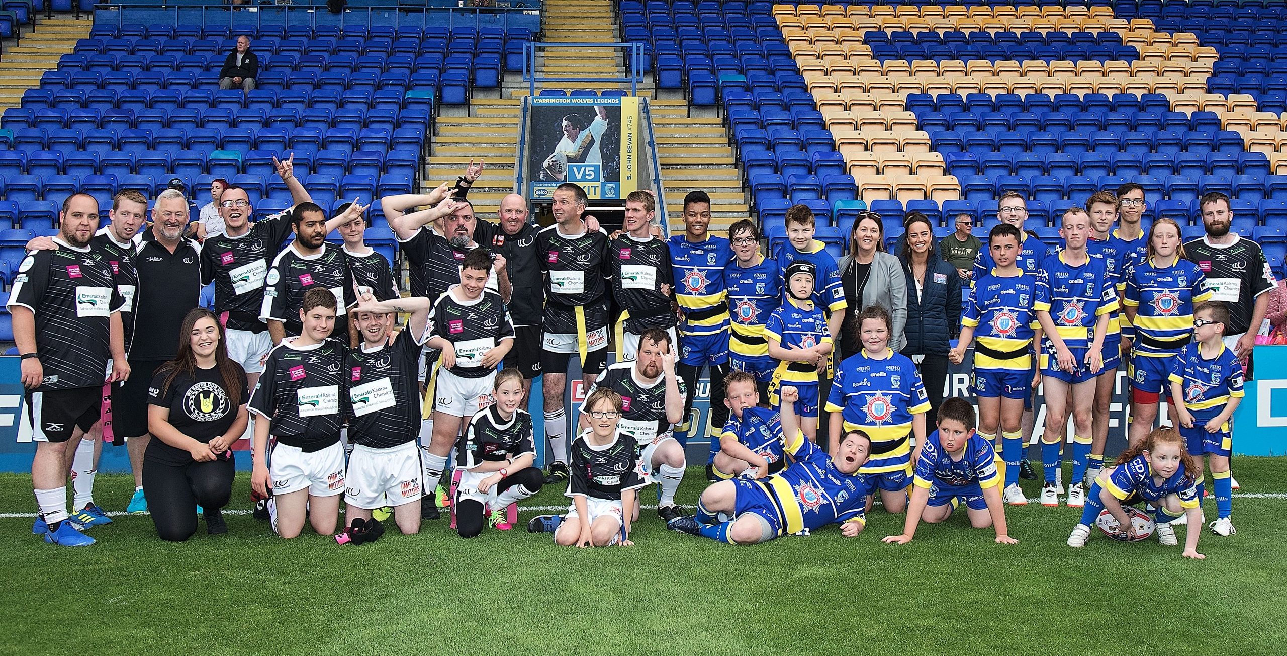 Widnes Vikings and Warrington Wolves learning disability super league team posing