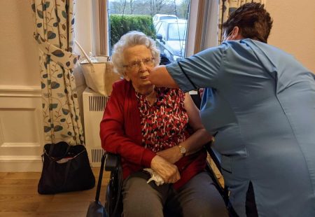 Person we support is one of first in the world to receive Pfizer COVID-19 vaccine