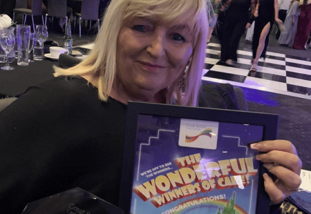 Support workOur colleague holding the South West Care Award.