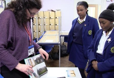 Veteran, Davina, working with pupils on resource.