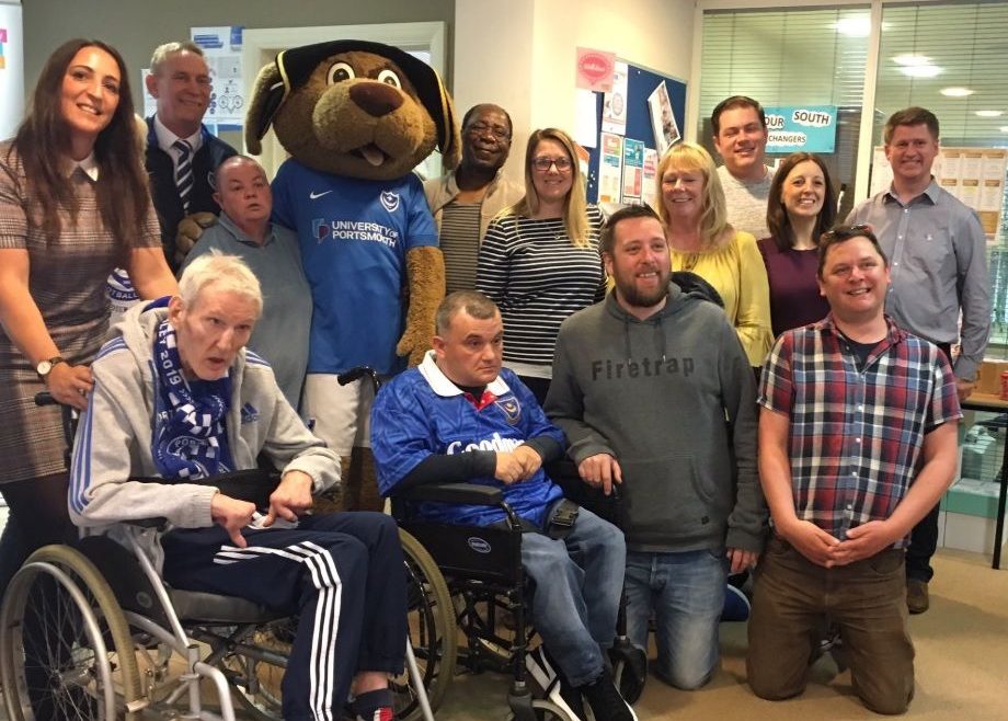 Portsmouth Partnership group shot with mascot