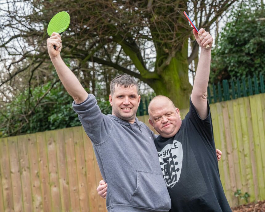 People with care and support needs playing table tennis
