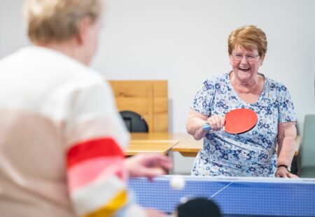 Women playing Table Tennis in care setting