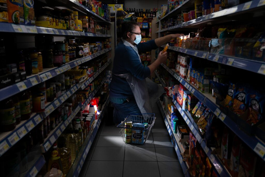 Francis Shacklady in full PPE at the local supermarket, shopping for the residents of the care home during lockdown