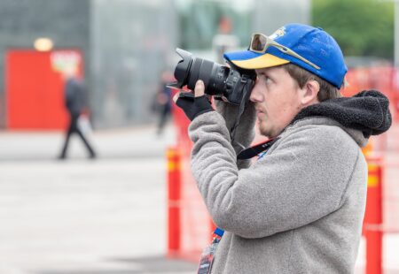 Inclusve Vlunteer captures photograph of stadium.