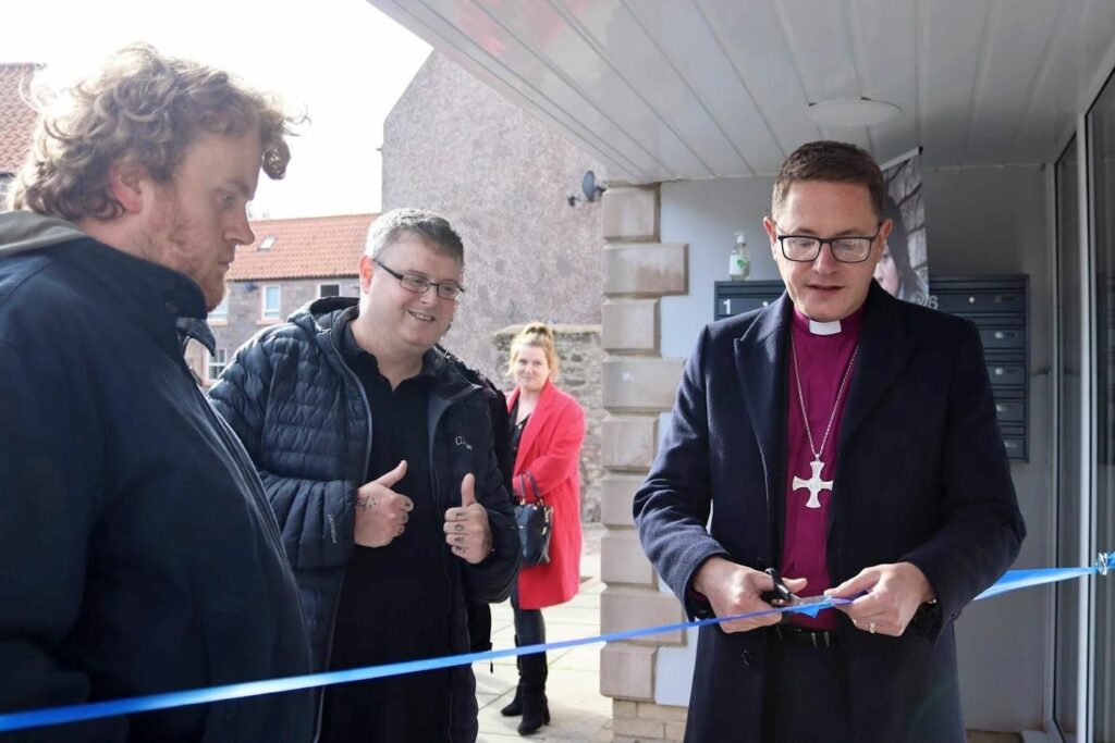 Bishop of Berwick cuts the ribbon and opens Henderson Court