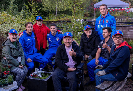Players from RLWC Italy men's team visit Inclusive Volunteers at Newton Community Garden