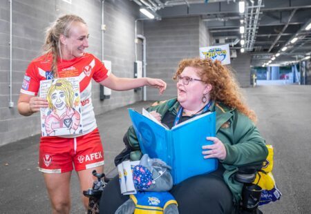 Jodie talking with Inclusive Volunteer