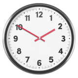 A black and white clock with red hands