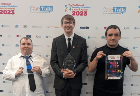 James, Matt and Joe holding trophies and certificates for the National LD Awards.