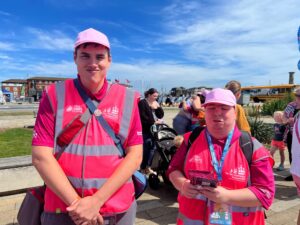 Inclusive volunteers posing for a photo at Tall Ships Event