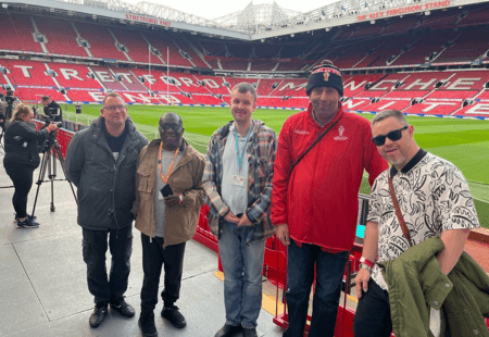 People we support stand pitchside at Old Trafford for the Super League Grand Final.