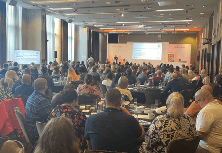 Speaking to crowds at international care sector event.