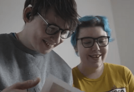 Matt and Elle laughing together.