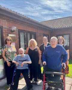 People we support and colleagues standing with local MP Kim Johnson 