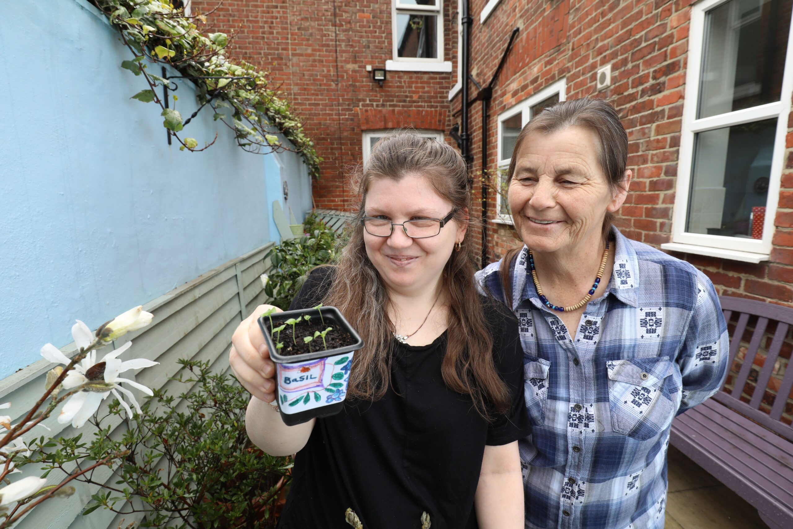 Young person in garden